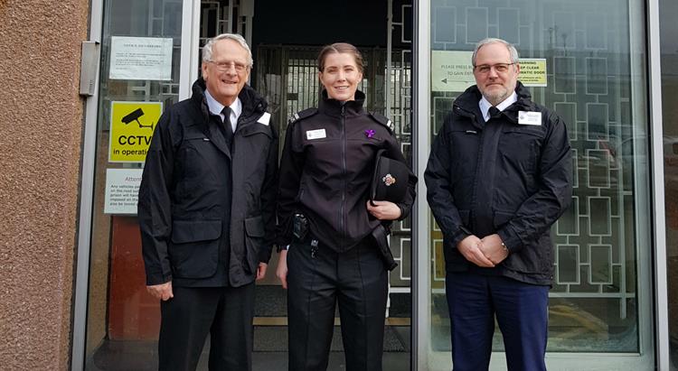 Len Norman and Gregory Guida stand with Gosia Hyjek