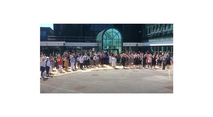 Staff outside Les Quennevais School 