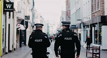 Photo of Police walking down high street